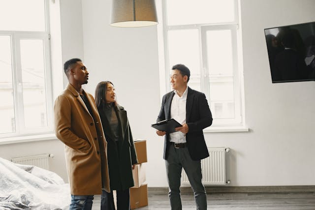 a%20landlord%20speaking%20with%20two%20prospective%20tenants